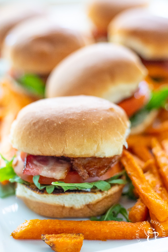 This easy recipe for BLT sliders with arugula and camp sauce is quick, flexible, and works as a main course, or a party or game day appetizer!