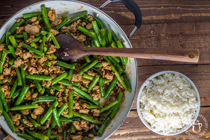 Szechuan Green Beans & Pork is an approachable, easy recipe that is incredibly tasty and feeds a family in about 15 minutes! 