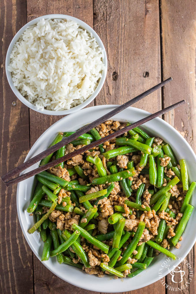 Szechuan Green Beans & Pork is an approachable, easy recipe that is incredibly tasty and feeds a family in about 15 minutes! 