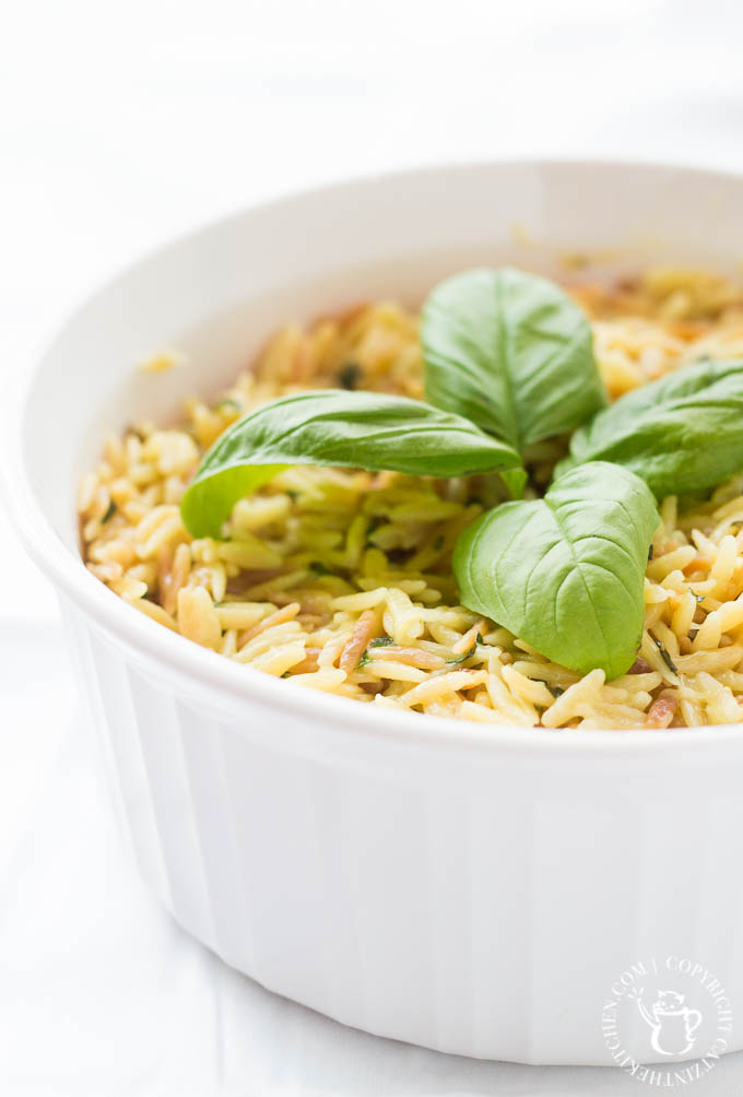 This recipe for Creamy Parmesan Orzo with basil is a tasty, easy side dish that goes with a wide variety of main dishes and is ready in 30 minutes! 