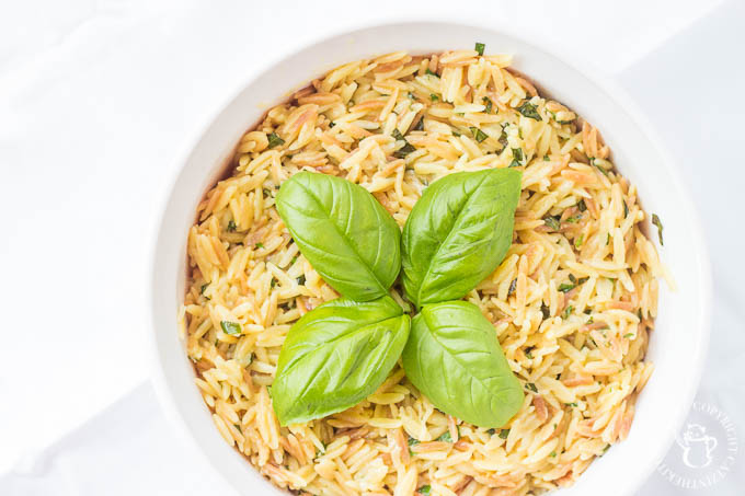 This recipe for Creamy Parmesan Orzo with basil is a tasty, easy side dish that goes with a wide variety of main dishes and is ready in 30 minutes! 