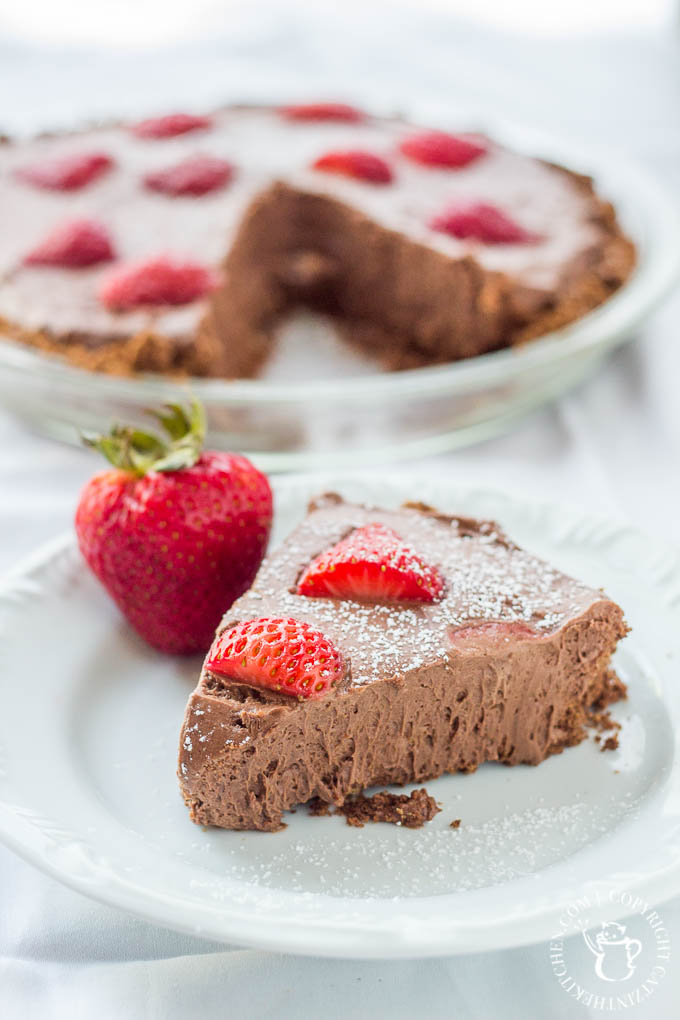 Dark Chocolate Cream Pie with fresh strawberries! This pie recipe is sweet but not too sweet, with deep cocoa flavor - definitely for the true chocolate lover! 