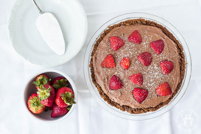 Dark Chocolate Cream Pie with fresh strawberries! This pie recipe is sweet but not too sweet, with deep cocoa flavor - definitely for the true chocolate lover! 