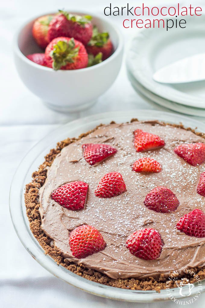 Dark Chocolate Cream Pie with fresh strawberries! This pie recipe is sweet but not too sweet, with deep cocoa flavor - definitely for the true chocolate lover! 