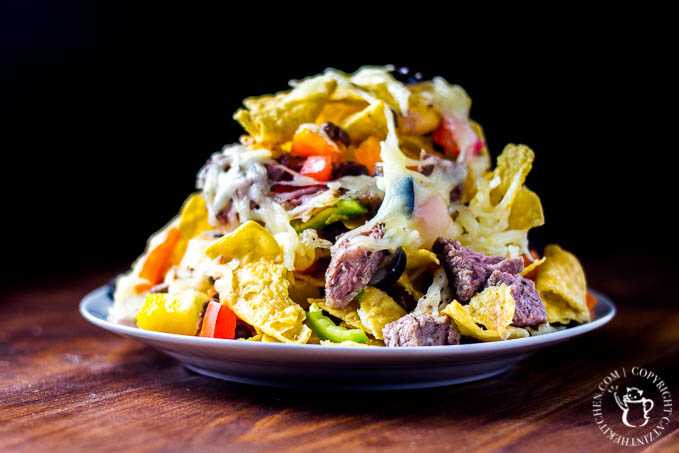 Loaded Baked Nachos Tired of the same old taco on your "Taco Tuesday" nights? Give these easy loaded baked nachos a try! They're bright, filling, and easy as pie!