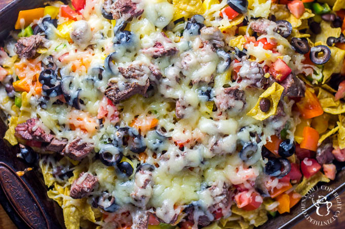 Loaded Baked Nachos Tired of the same old taco on your "Taco Tuesday" nights? Give these easy loaded baked nachos a try! They're bright, filling, and easy as pie!