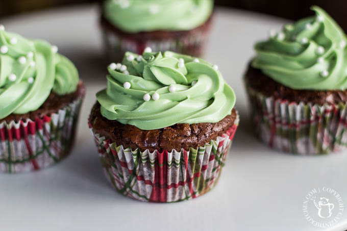 The green frosting is for St. Patrick's Day. The brownies and espresso are for blowing your mind. This recipe for minty espresso brownie cupcakes might just be the best thing about March!