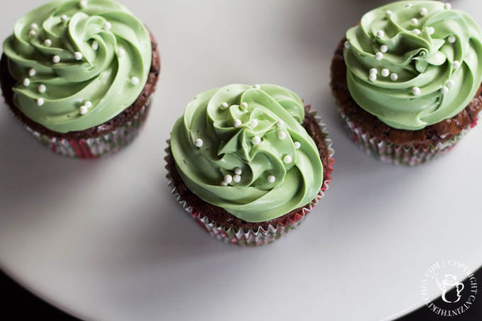 The green frosting is for St. Patrick's Day. The brownies and espresso are for blowing your mind. This recipe for minty espresso brownie cupcakes might just be the best thing about March!