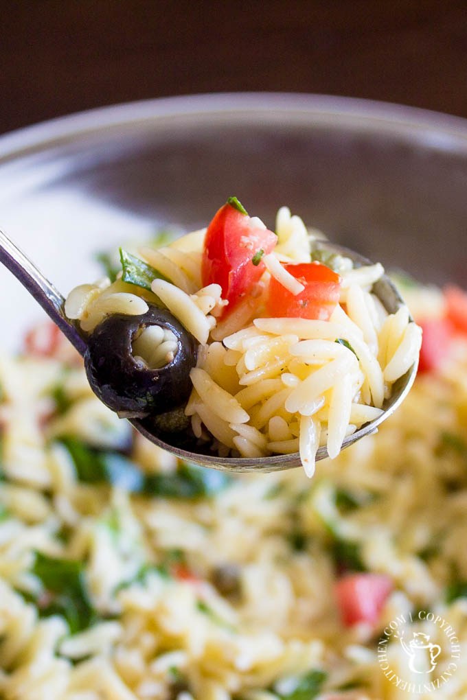 Chilled Orzo Salad - simple, fresh ingredients like tomatoes, olives, and spinach thrown together with pasta and Italian dressing - a scrumptious side dish!