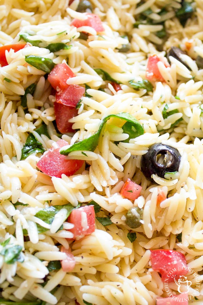 Chilled Orzo Salad - simple, fresh ingredients like tomatoes, olives, and spinach thrown together with pasta and Italian dressing - a scrumptious side dish!