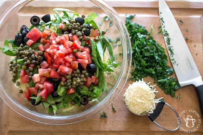 Chilled Orzo Salad - simple, fresh ingredients like tomatoes, olives, and spinach thrown together with pasta and Italian dressing - a scrumptious side dish!