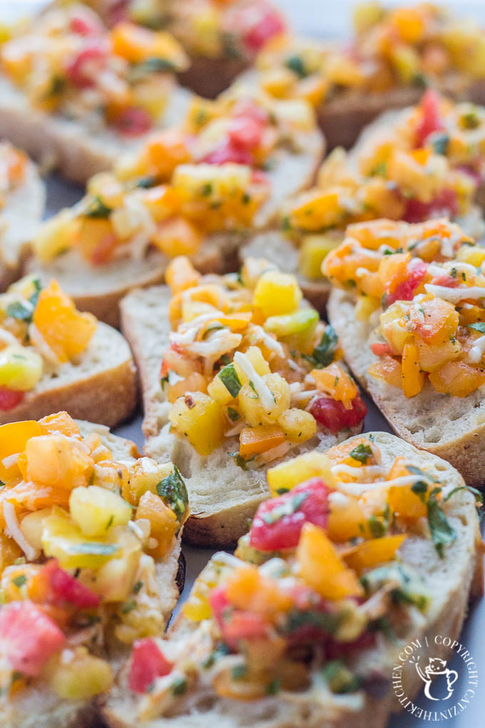 Heirloom Tomato Bruschetta is our favorite, simple go-to recipe for light, healthy summer grilling! This recipe has five ingredients, & is ready in 15 min!