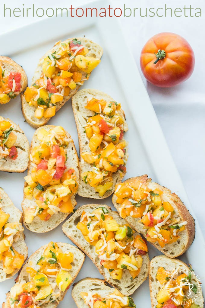 Heirloom Tomato Bruschetta is our favorite, simple go-to recipe for light, healthy summer grilling! This recipe has five ingredients, & is ready in 15 min!