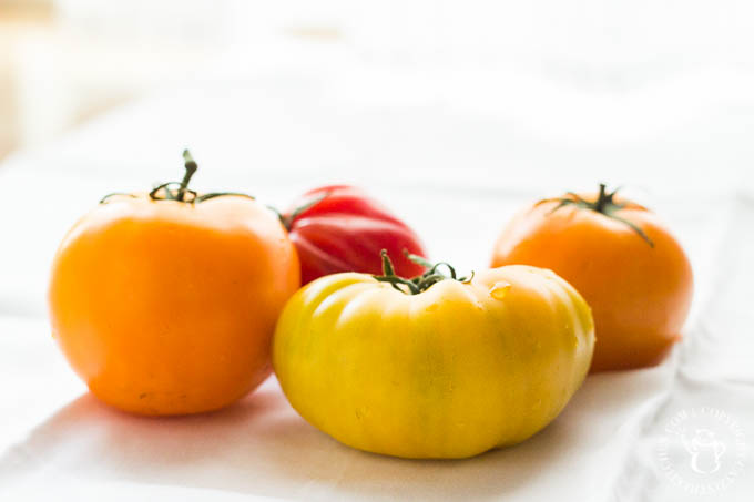 Heirloom Tomato Bruschetta is our favorite, simple go-to recipe for light, healthy summer grilling! This recipe has five ingredients, & is ready in 15 min!