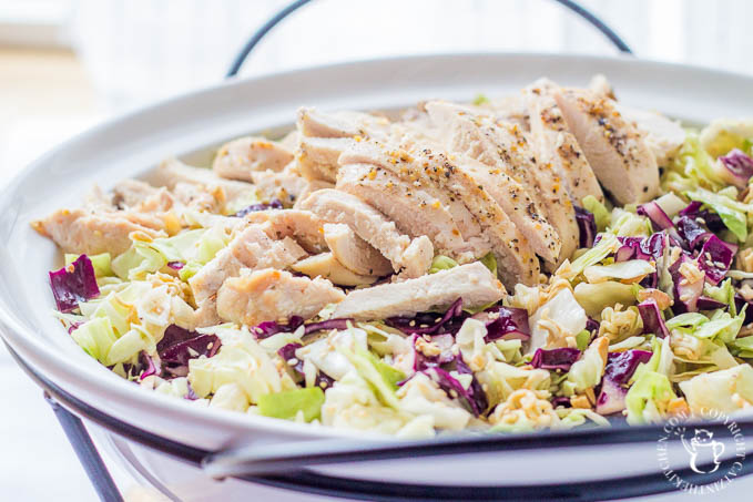Oriental Chicken Salad is light, yummy, and full of crunch - a perfect summer salad! It's an easy way to feed a crowd - or make sure there will be seconds!