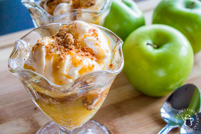 Cooked apples, crunchy crumble, drizzled caramel sauce, and creamy vanilla ice cream equal a seriously yummy apple crumble sundae recipe! 