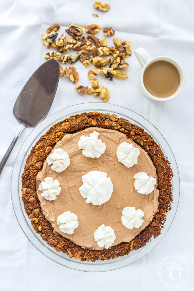 Chocolate Coffee Crunch Pie is a dessert recipe that checks all the boxes! It's got velvety chocolate, savory espresso, crunchy walnuts, and whipped cream!