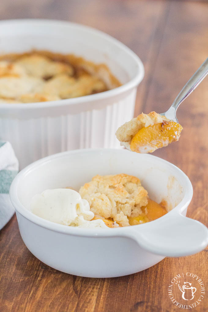 Old Fashioned Peach Cobbler is literally a recipe for comfort! This easy dessert features hints of cinnamon and nutmeg alongside sweet, juicy peaches - yum!