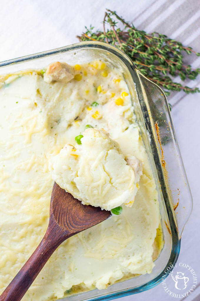 This Chicken Shepherd's Pie may look like a pan full of mashed potatoes, but it is flavorful and zesty, filled with the flavors of Swiss cheese, sage, and thyme! 