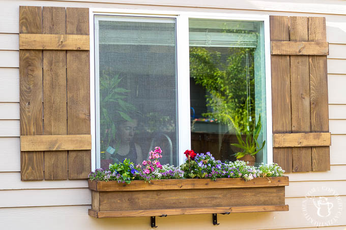 Looking to dress up a plain exterior window? It doesn't get any cheaper, easier, or more flexible than this plan for a DIY Window Box and Shutters!