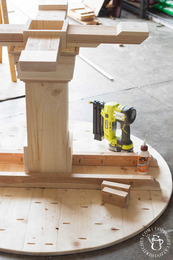 A simple project that looks simultaneously rustic & refined upon completion, this DIY Farmhouse Round Table is the perfect way to open up your dining space!