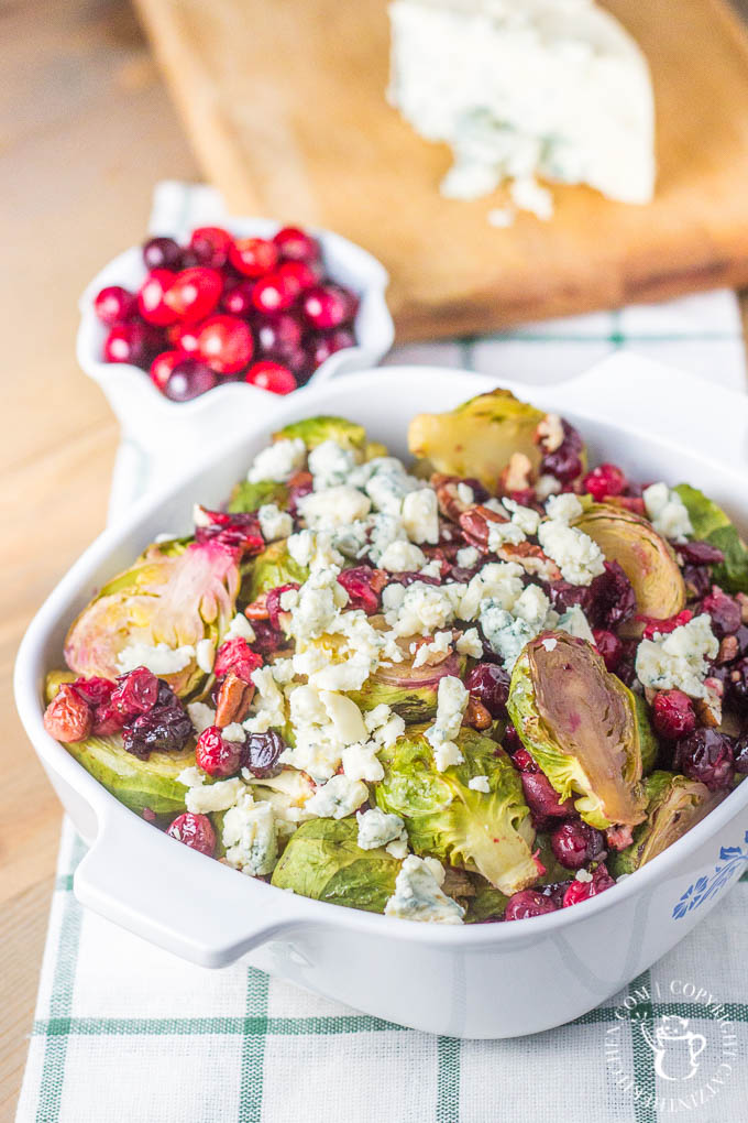 Maple Roasted Brussels Sprouts with Cranberries is a side dish recipe that is easy to make, incredibly flavorful, and just looks like Christmas!