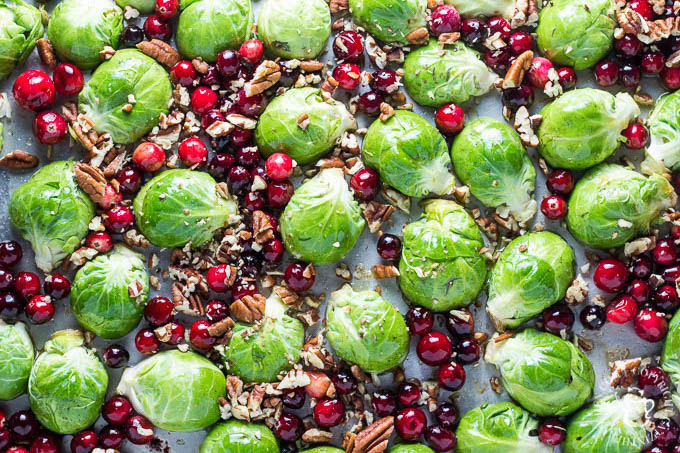 Maple Roasted Brussels Sprouts with Cranberries is a side dish recipe that is easy to make, incredibly flavorful, and just looks like Christmas!