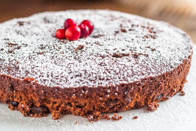 It's the holidays, and I don't know about you, but I don't have time for complicated. This chocolate cranberry spice cake is easy, so yummy, and festive!