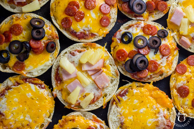 These fun, easy, quick English muffin pizzas are a family favorite - we make them all the time! The kids love designing their own mini pizza masterpieces!