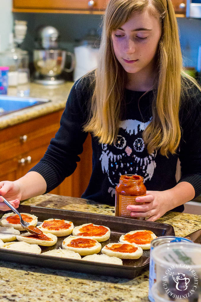 These fun, easy, quick English muffin pizzas are a family favorite - we make them all the time! The kids love designing their own mini pizza masterpieces!