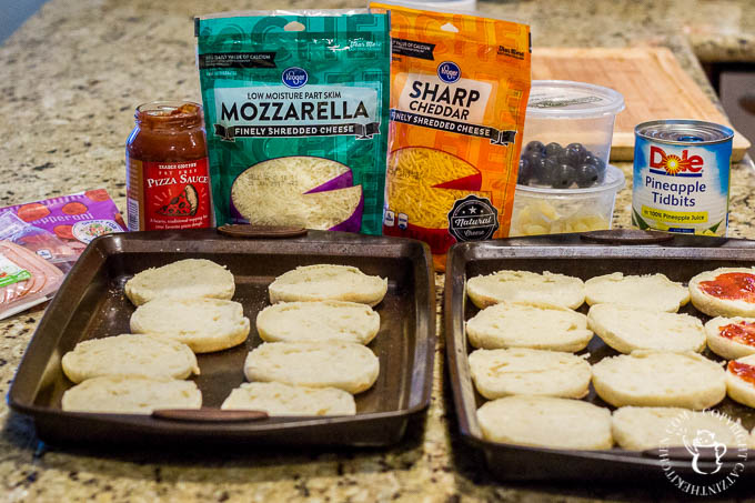 These fun, easy, quick English muffin pizzas are a family favorite - we make them all the time! The kids love designing their own mini pizza masterpieces!