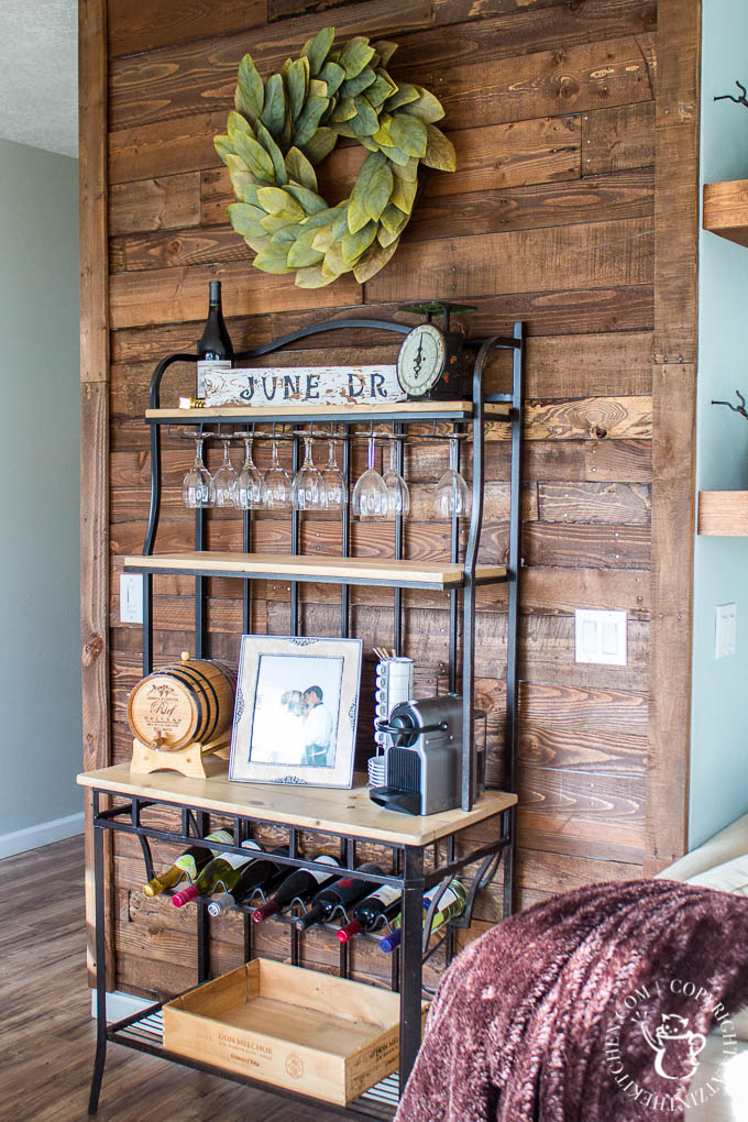 A DIY Pallet Wall is an inexpensive, homey way to add a big dose of character to almost any room! Here are some things we learned doing ours!