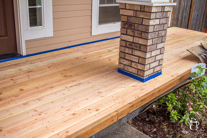 If you've ever thought about turning your cement porch into a wood deck, it's surprisingly easy! Here are some thoughts, tips, & photos from our experience!