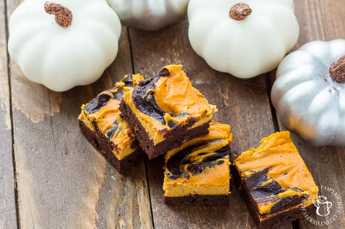 These swirled pumpkin cheesecake brownies are fun, festive, and easy to make! Not too sweet, with a subtle pumpkin flavor, let the kiddos help whip them up!