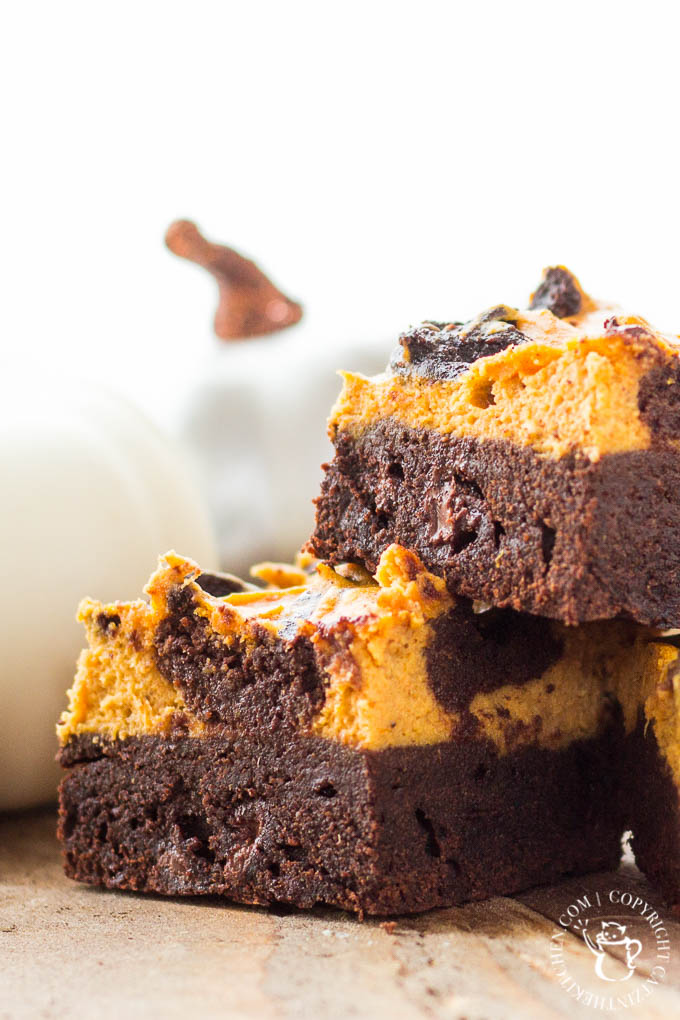 These swirled pumpkin cheesecake brownies are fun, festive, and easy to make! Not too sweet, with a subtle pumpkin flavor, let the kiddos help whip them up!