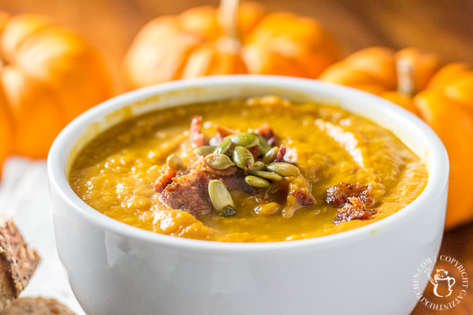 This recipe for pumpkin soup made in the slow cooker is easy, zesty, and bursting with the taste of autumn! Prep in the morning & have an effortless dinner! #pumpkin