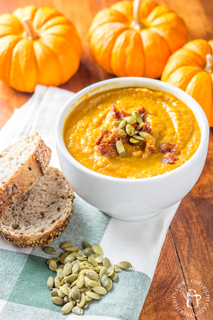This recipe for pumpkin soup made in the slow cooker is easy, zesty, and bursting with the taste of autumn! Prep in the morning & have an effortless dinner! #pumpkin