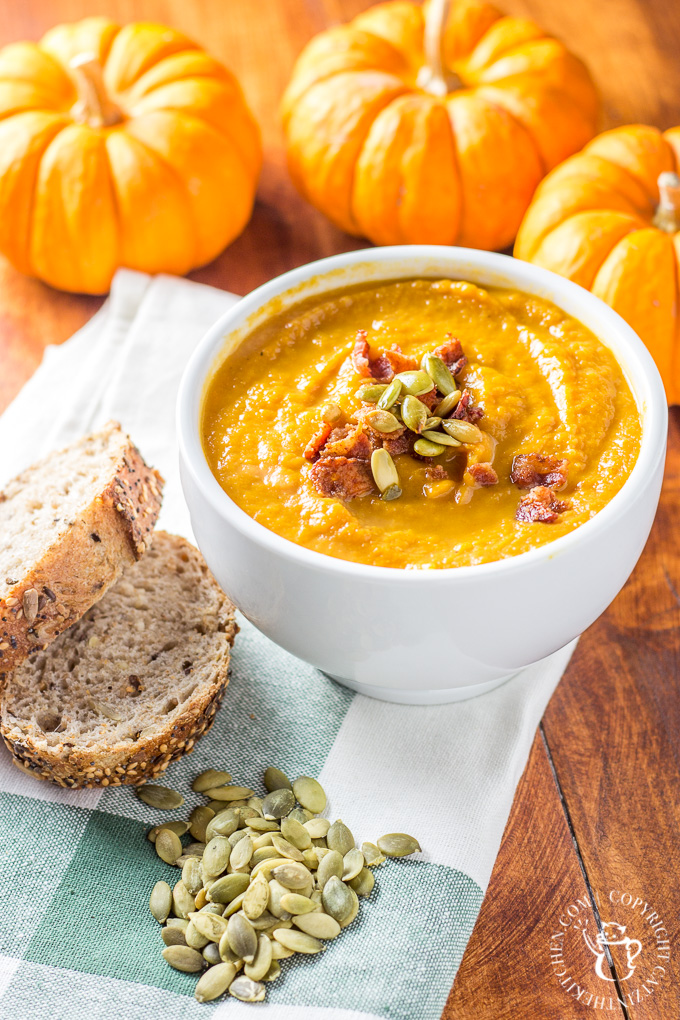 This recipe for pumpkin soup made in the slow cooker is easy, zesty, and bursting with the taste of autumn! Prep in the morning & have an effortless dinner! #pumpkin