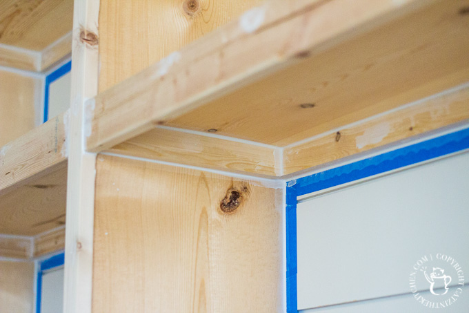 DIY bookshelf caulking 