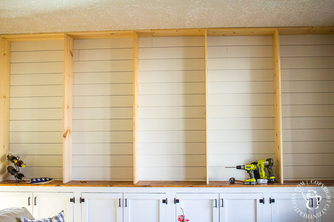 built-in shiplap bookshelf