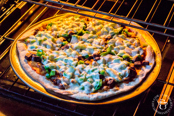 Love the classic combo of steak, cheese, and fried onions? Turn that sandwich craving into pie form with this easy and quick Philly Cheesesteak Pizza! 