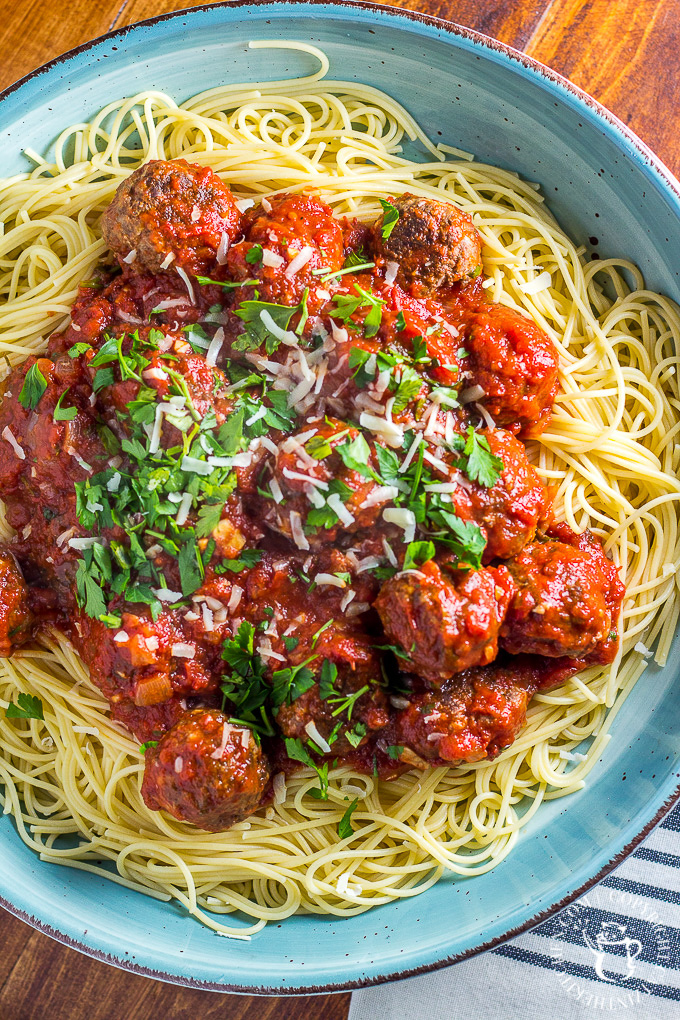 Finding spaghetti and meatballs a bit bland? So were we! This recipe for the classic pasta dish is easy, cheap, and bursting with flavor! 