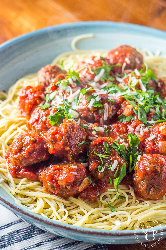 Finding spaghetti and meatballs a bit bland? So were we! This recipe for the classic pasta dish is easy, cheap, and bursting with flavor! 