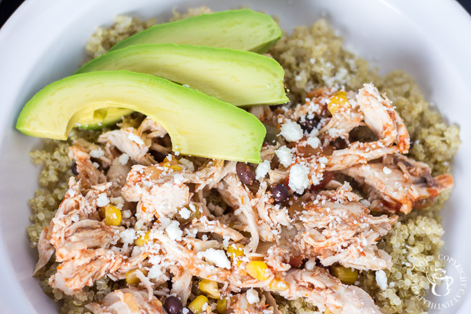 This recipe for a Simple & Healthy Chicken Fiesta Quinoa Bowl is quick, easy, and comes together in the slow cooker! You can't beat that. Add a little avocado and queso fresco and you've got a tasty dinner.