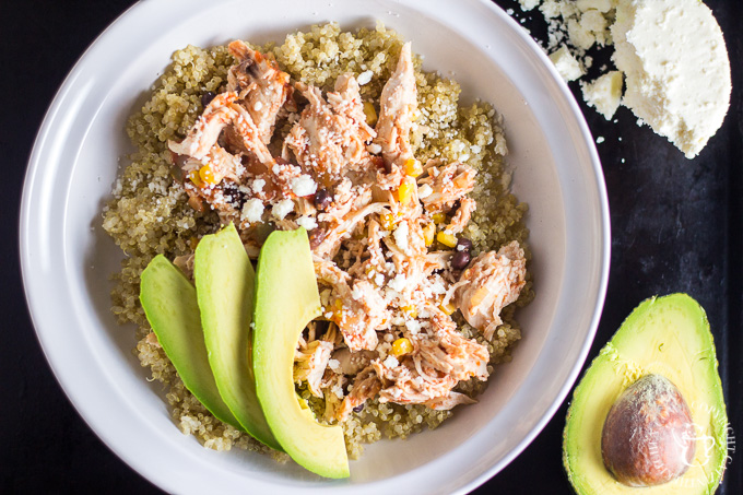 This recipe for a Simple & Healthy Chicken Fiesta Quinoa Bowl is quick, easy, and comes together in the slow cooker! You can't beat that. Add a little avocado and queso fresco and you've got a tasty dinner.