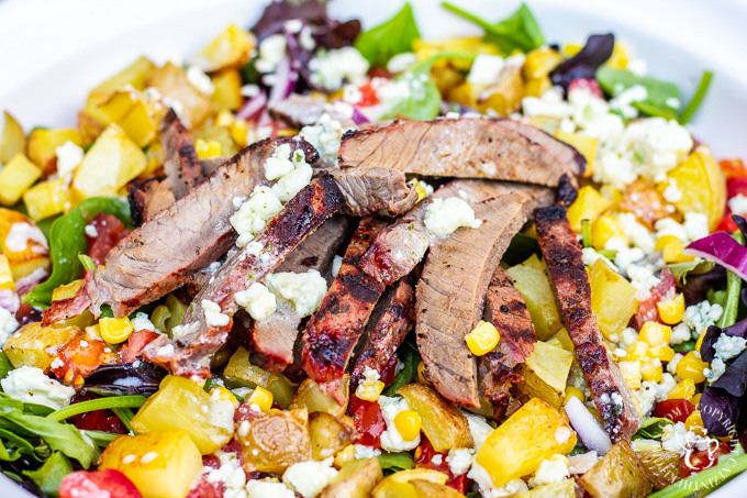 This is not your typical salad. It's got blue cheese. It's got potatoes. It's got steak. If you want a hearty, tasty dinner...cowboy steak salad!