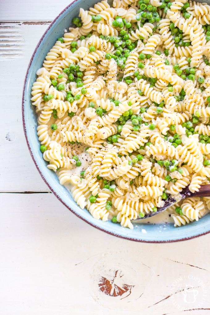 This Lemon and Pea Alfredo is an Italian summer pasta dream come true! Bright, fresh, nutty, creamy, and tangy, it's flavor-forward in the best possible way.