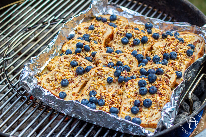 Made on the grill or the campfire, this Grilled Blueberry French Toast is smoky & decadent, but still fresh and sweet, thanks to the blueberries and syrup!