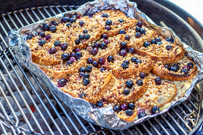 Made on the grill or the campfire, this Grilled Blueberry French Toast is smoky & decadent, but still fresh and sweet, thanks to the blueberries and syrup!