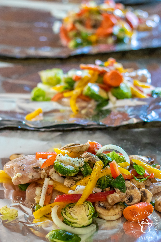 Grilling these simple chicken foil packets is an easy, tasty way to get a flavorful, healthy meal on the table, whether you're camping or at home!